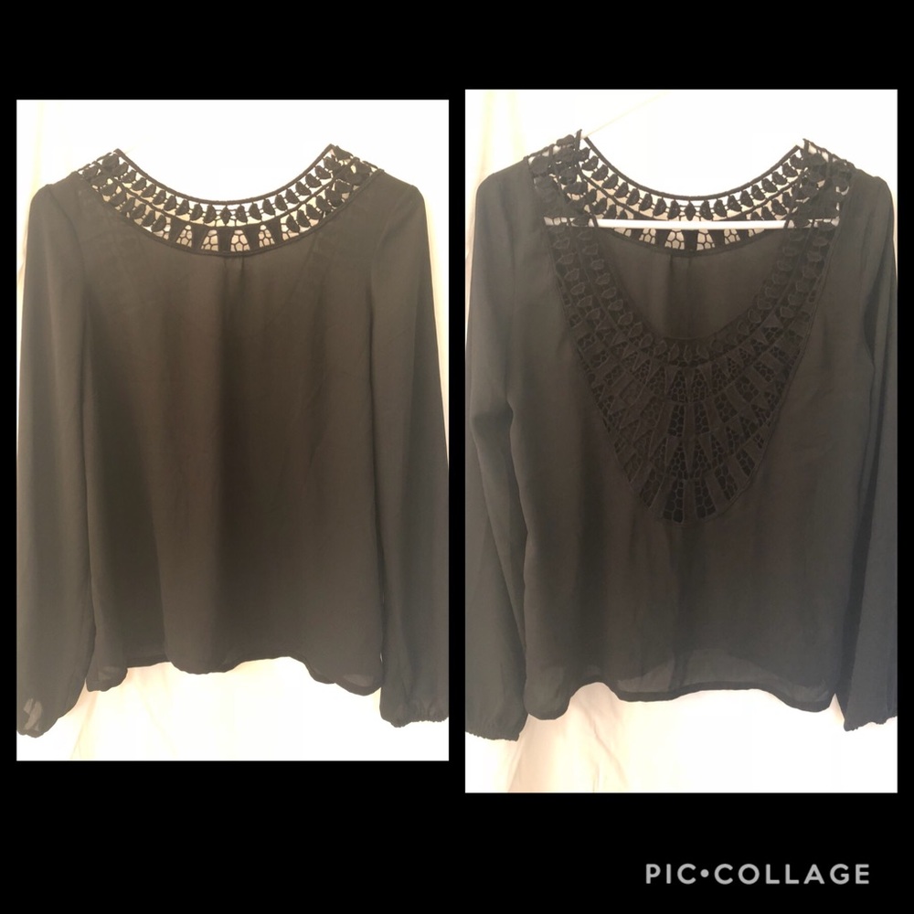 🍾 H&M black blouse with crochet detail.